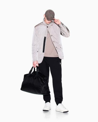 Jogger pants with metal logo