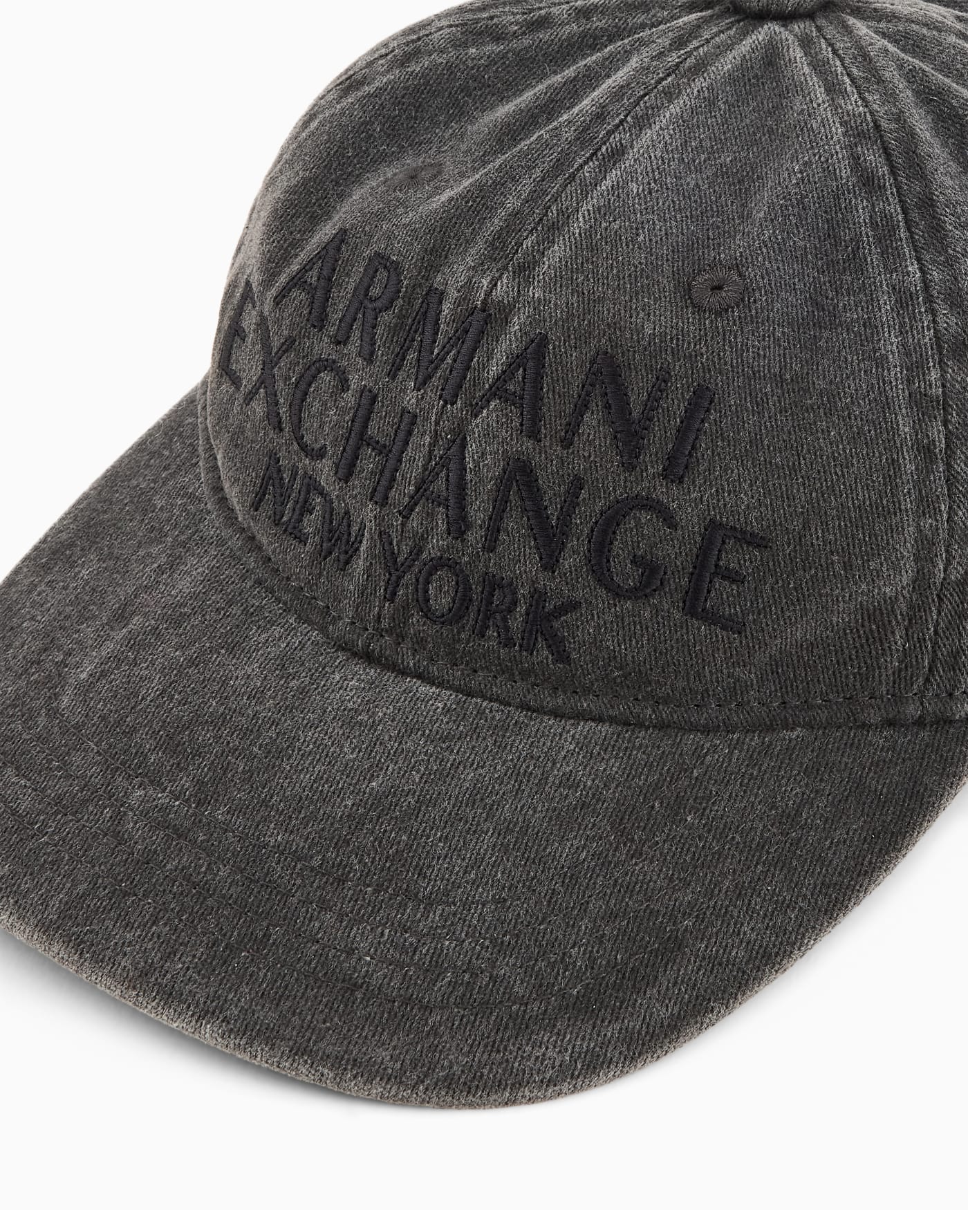 Used-effect visor hat