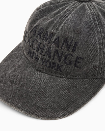Used-effect visor hat