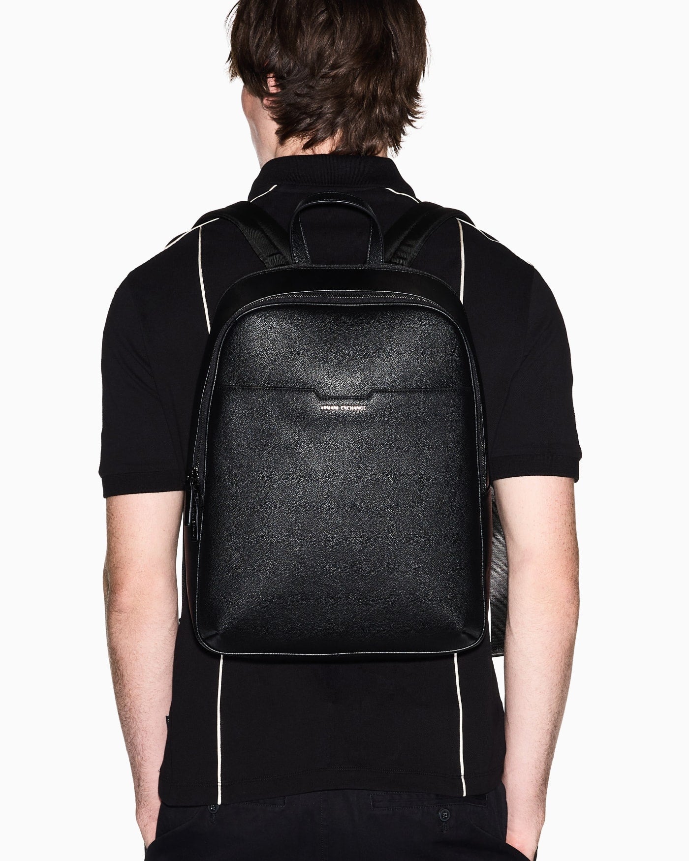 Minimalist backpack with adjustable straps and zip closure