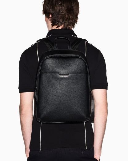 Minimalist backpack with adjustable straps and zip closure