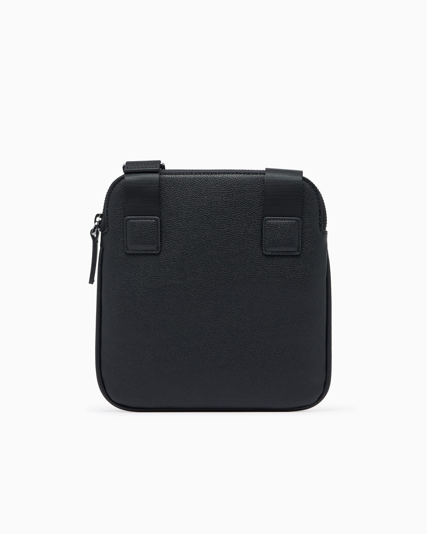 Textured crossbody bag with a zipper and adjustable strap