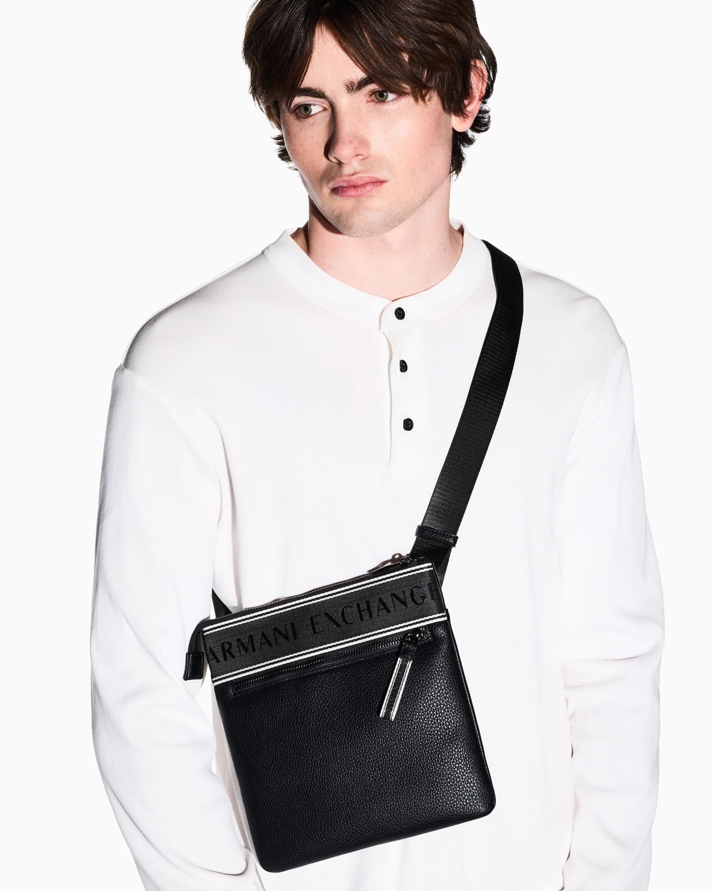 Flat crossbody messenger bag in coated fabric