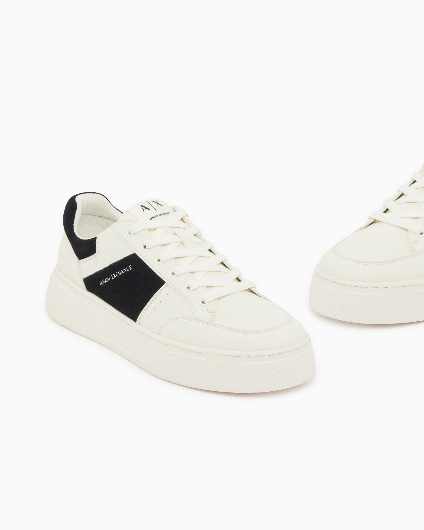 Sneaker with suede inserts