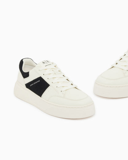 Sneaker with suede inserts