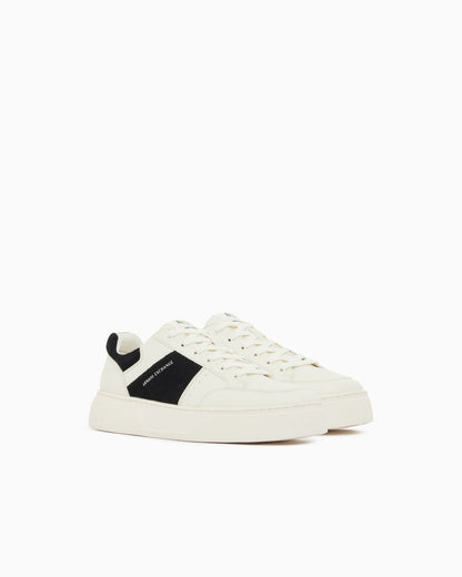 Sneaker with suede inserts