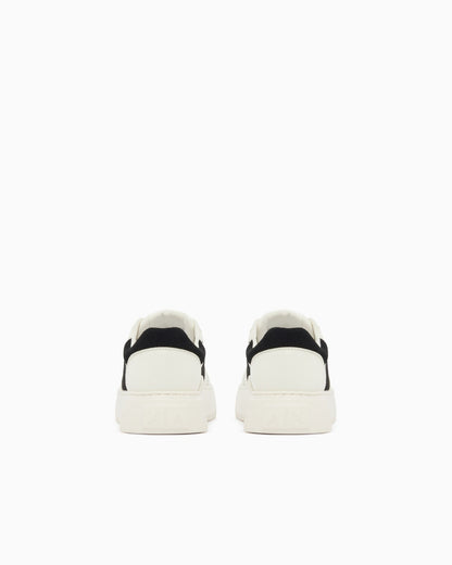 Sneaker with suede inserts