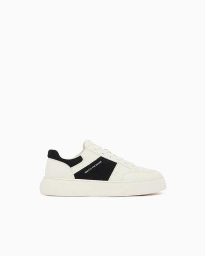 Sneaker with suede inserts