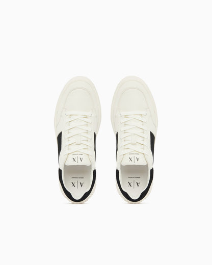 Sneaker with suede inserts
