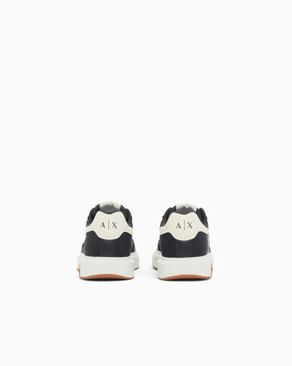 Sneakers with contrasting logo