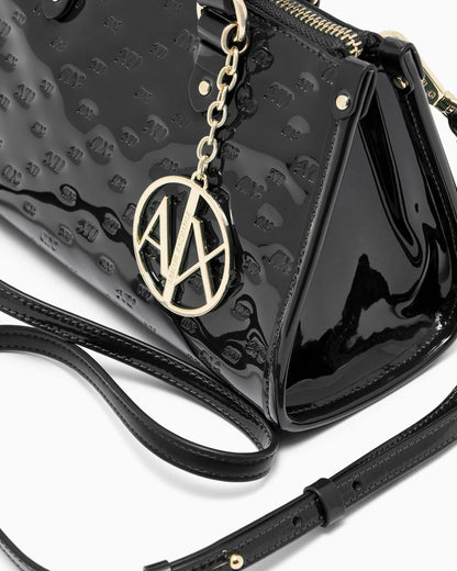 Glossy handbag with embossed pattern and detachable strap