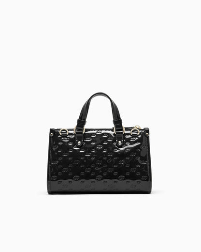 Glossy handbag with embossed pattern and detachable strap