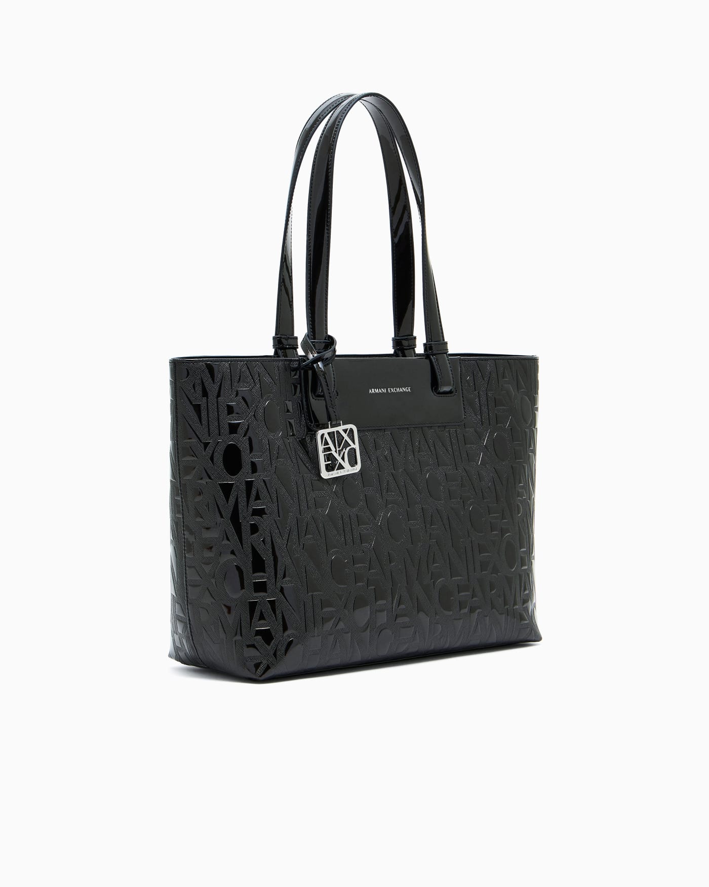 Tote bag with an embossed pattern and a metallic charm