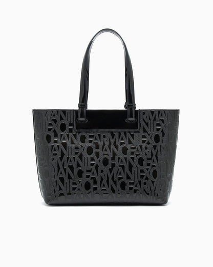 Tote bag with an embossed pattern and a metallic charm