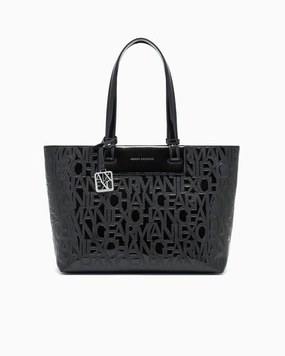 Tote bag with an embossed pattern and a metallic charm