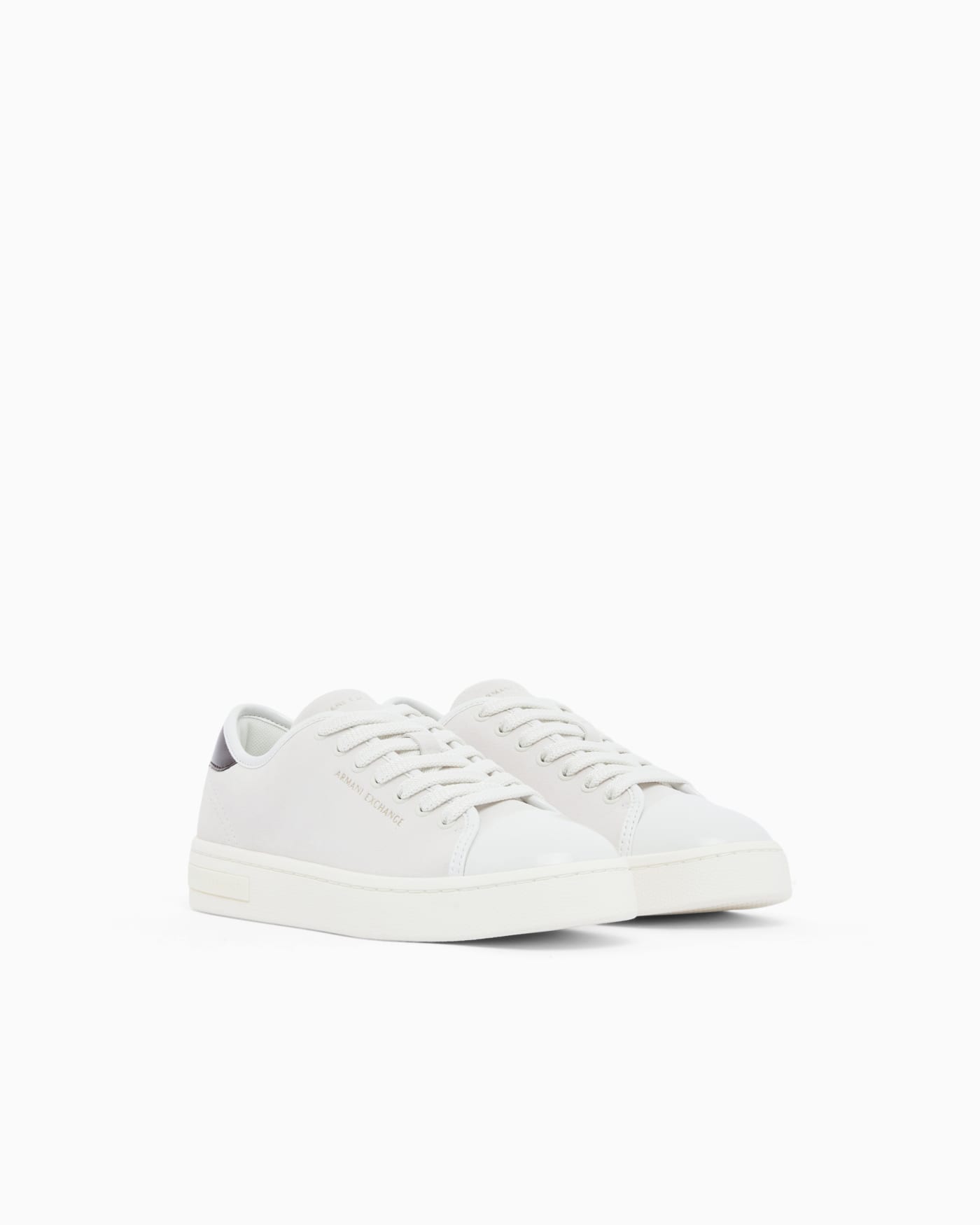Sneakers in suede with patent inserts