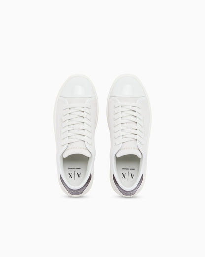 Sneakers in suede with patent inserts