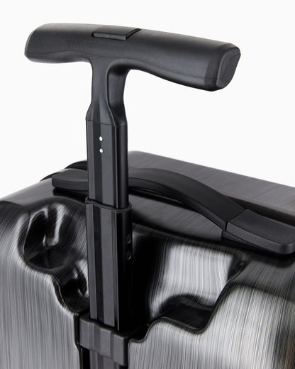 ABS carry-on bag with oversized, embossed eagle