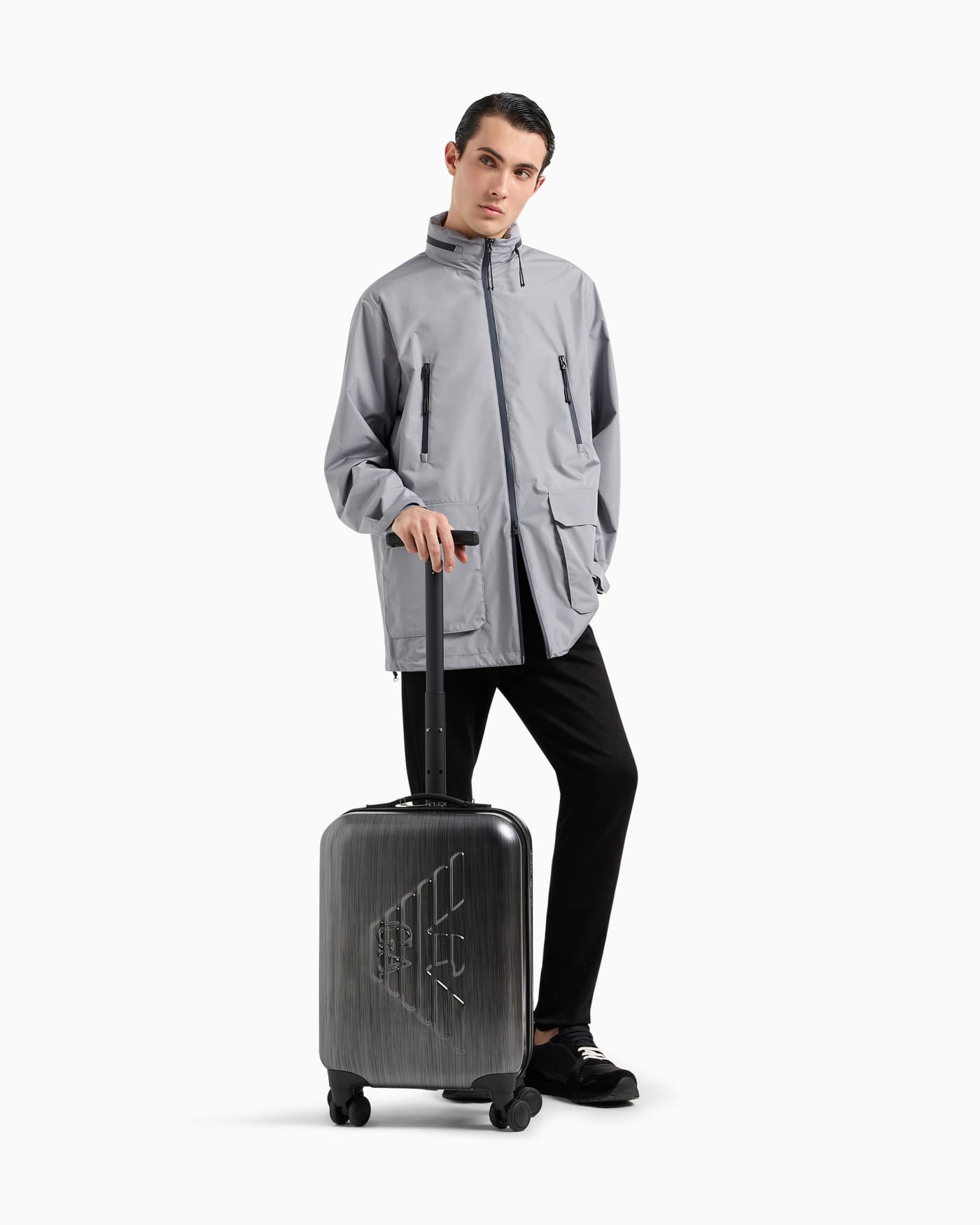ABS carry-on bag with oversized, embossed eagle