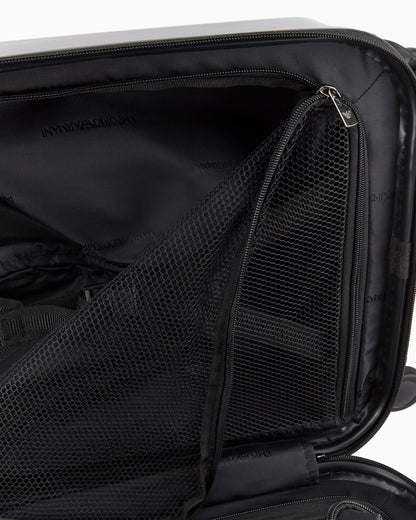 ABS carry-on bag with oversized, embossed eagle