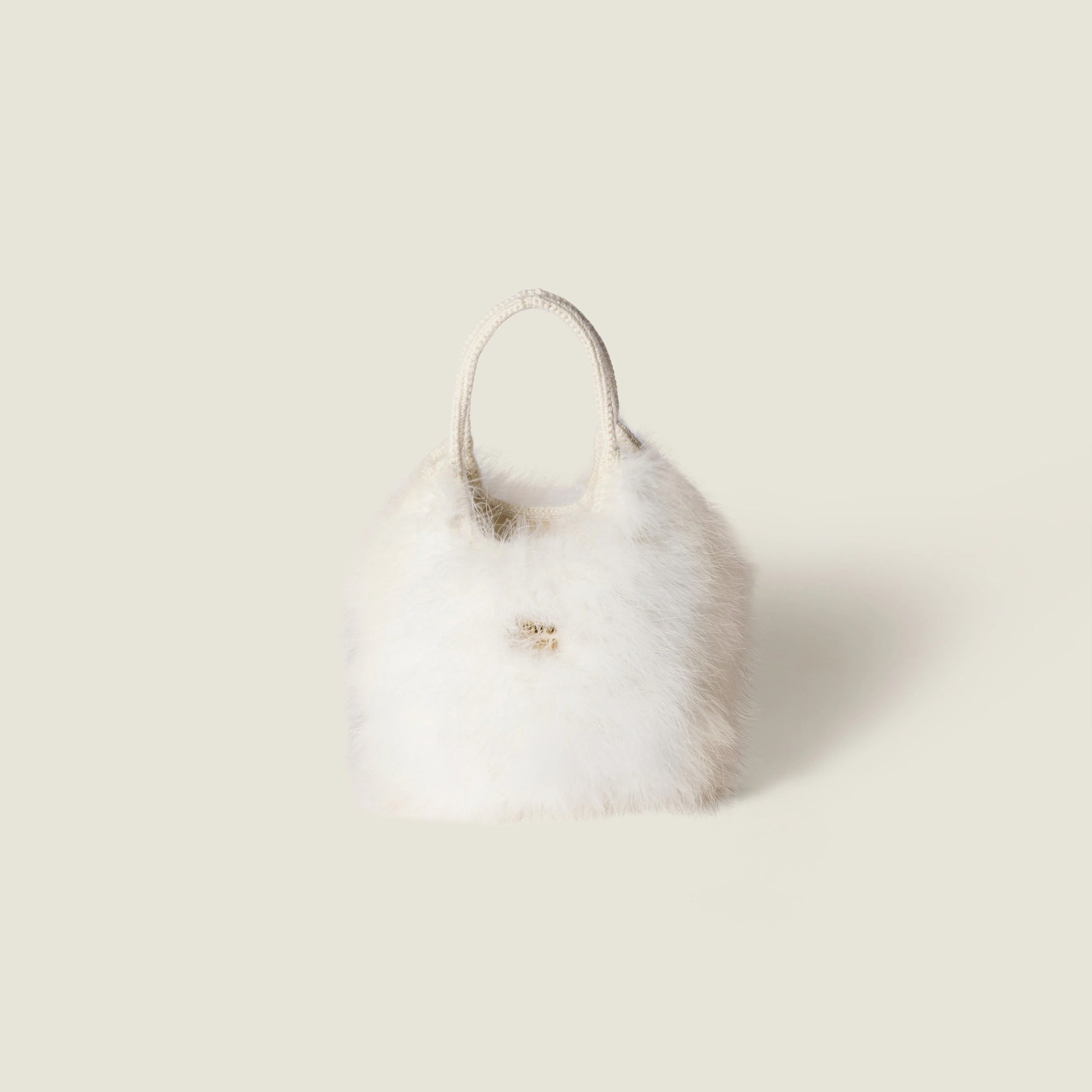 Ivy crochet handbag with feathers