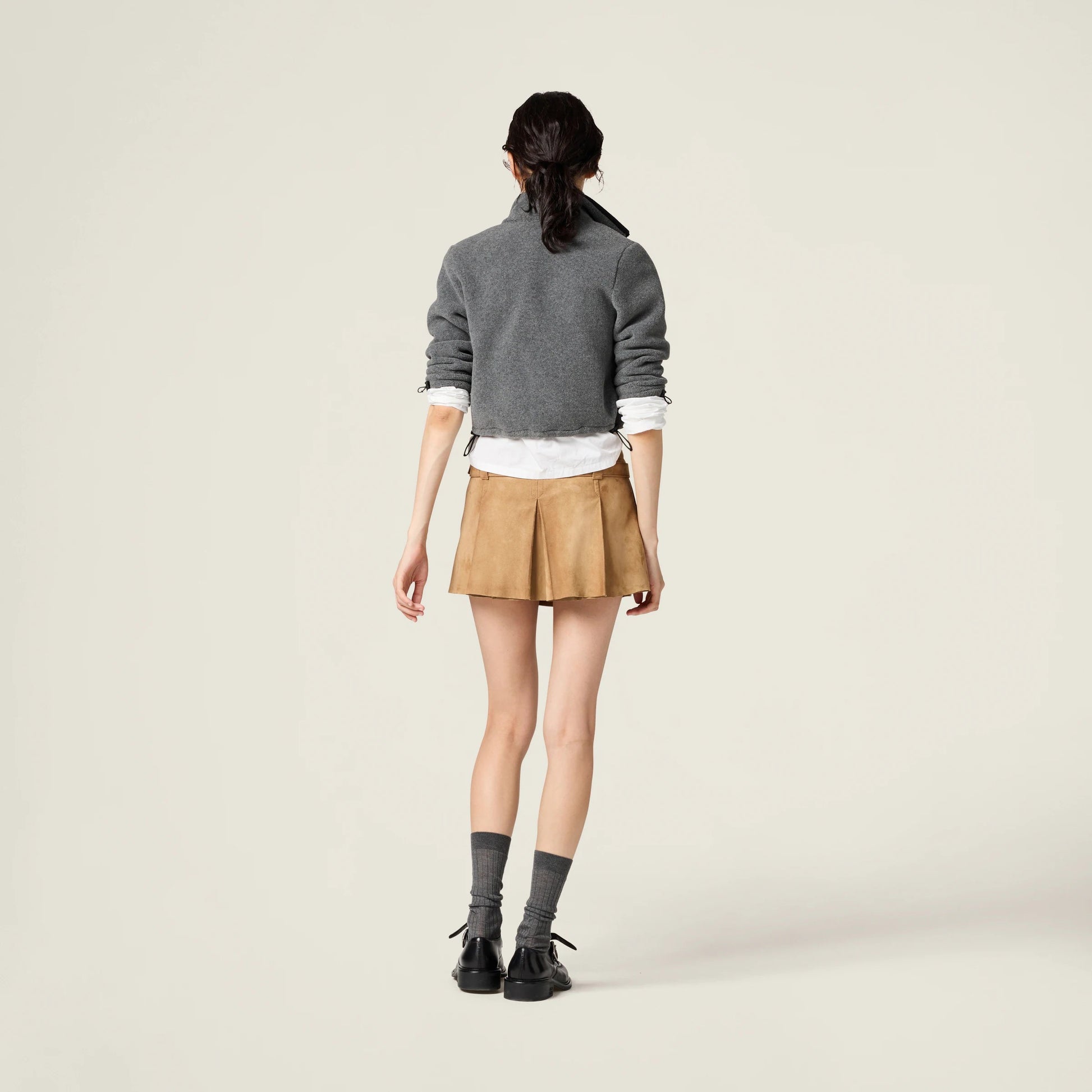 Pleated suede skirt