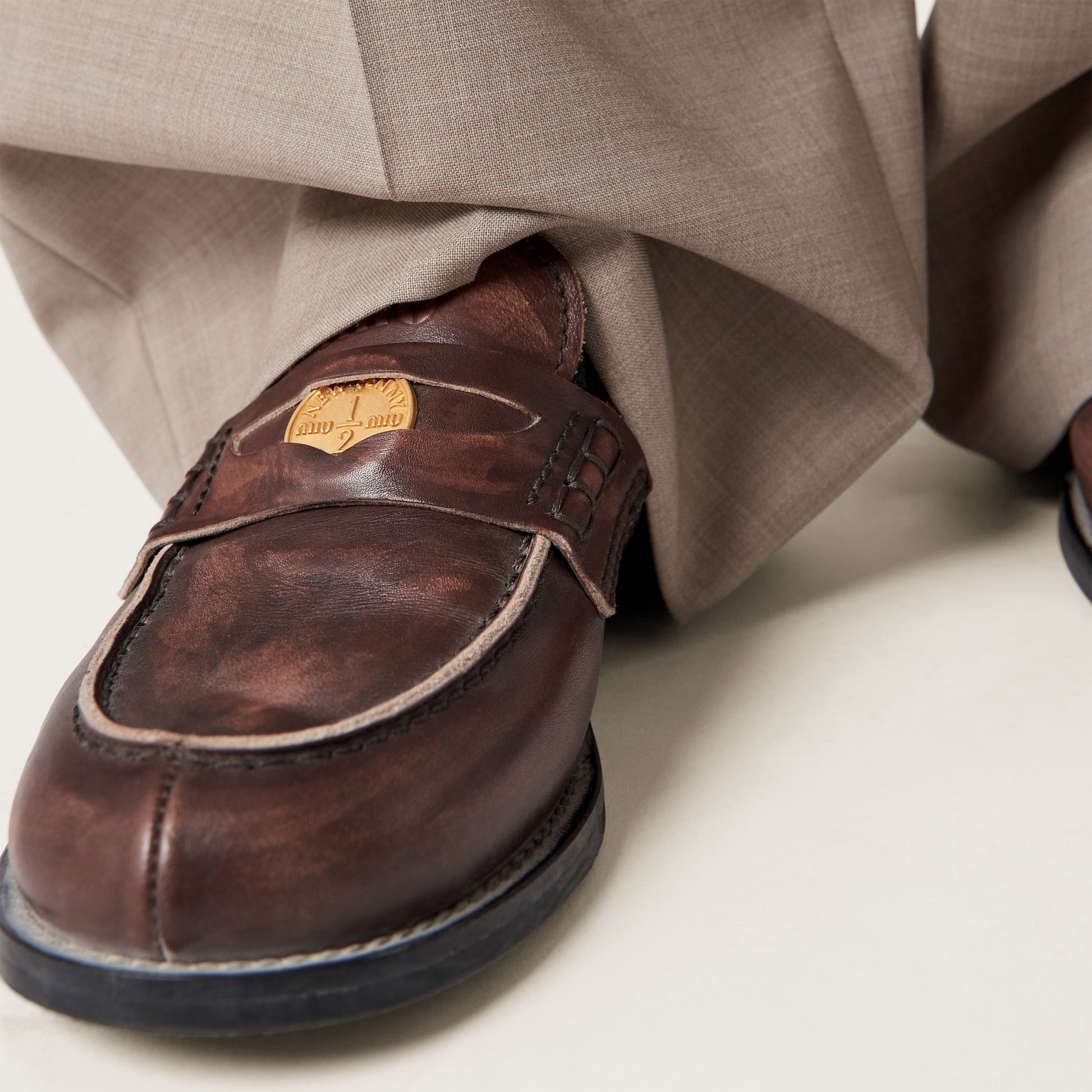 Vintage-effect leather penny loafers