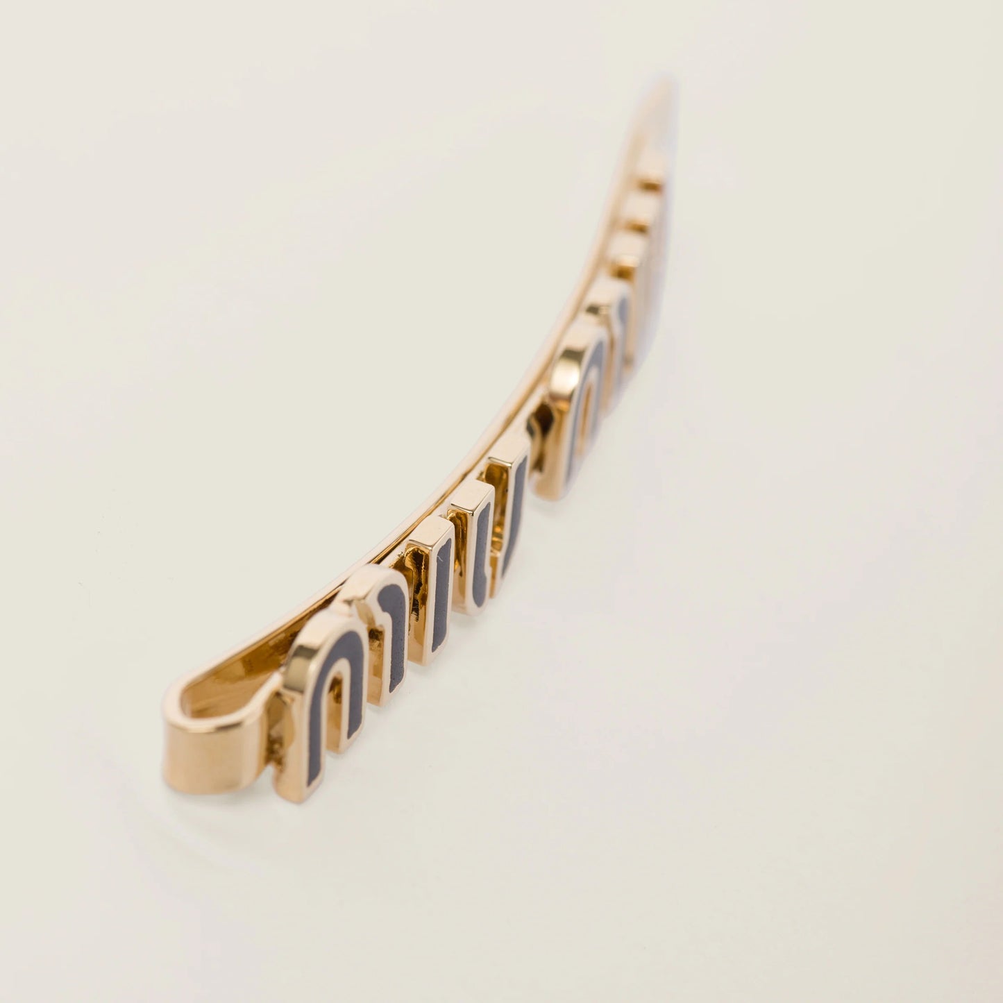 Enameled metal hair clip