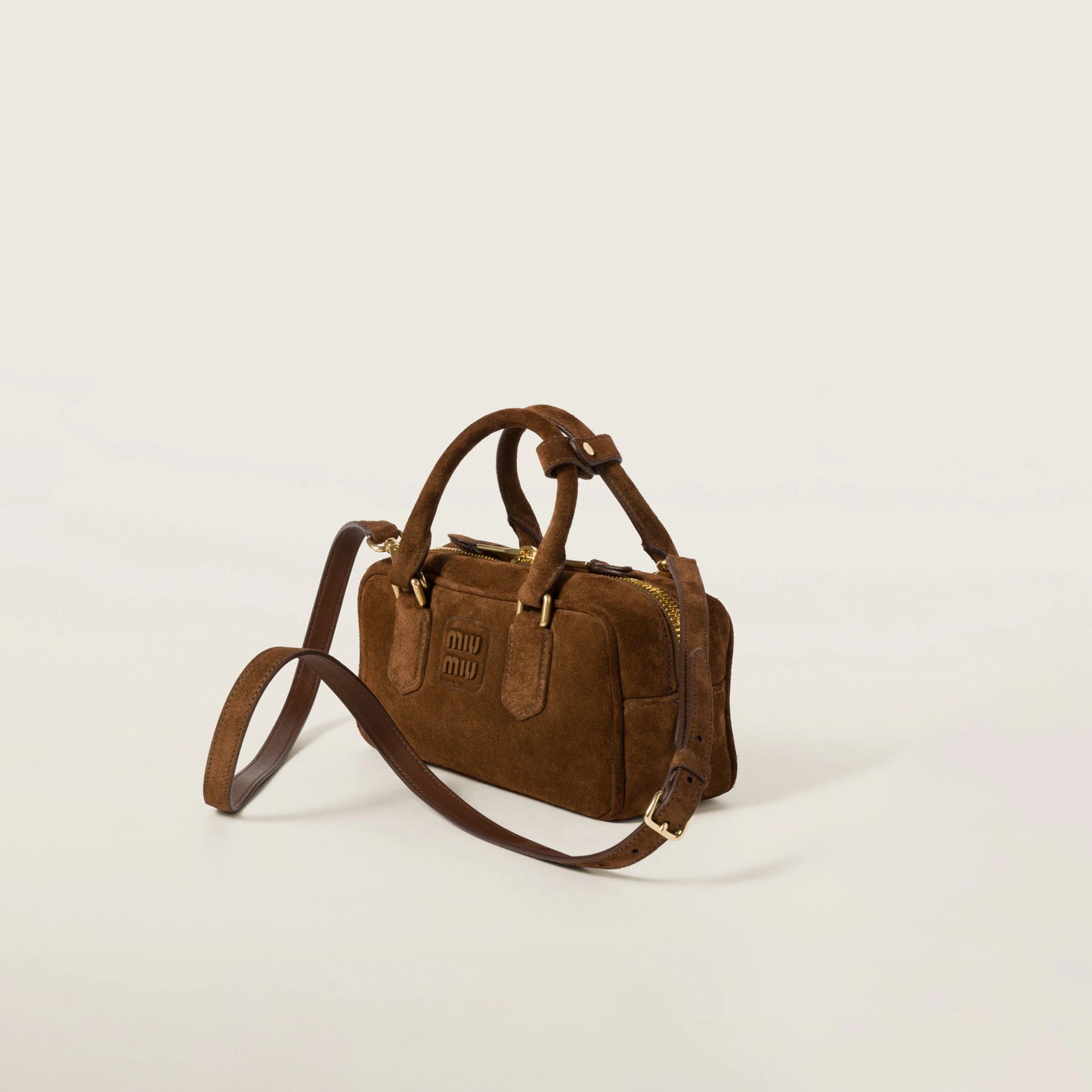 Arcadie padded suede top-handle bag