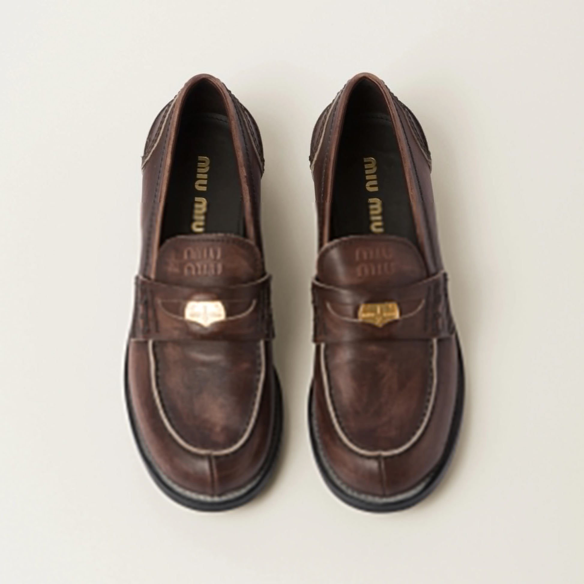 Vintage-effect leather penny loafers