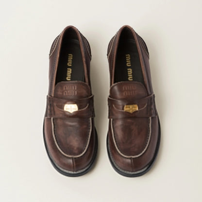 Vintage-effect leather penny loafers