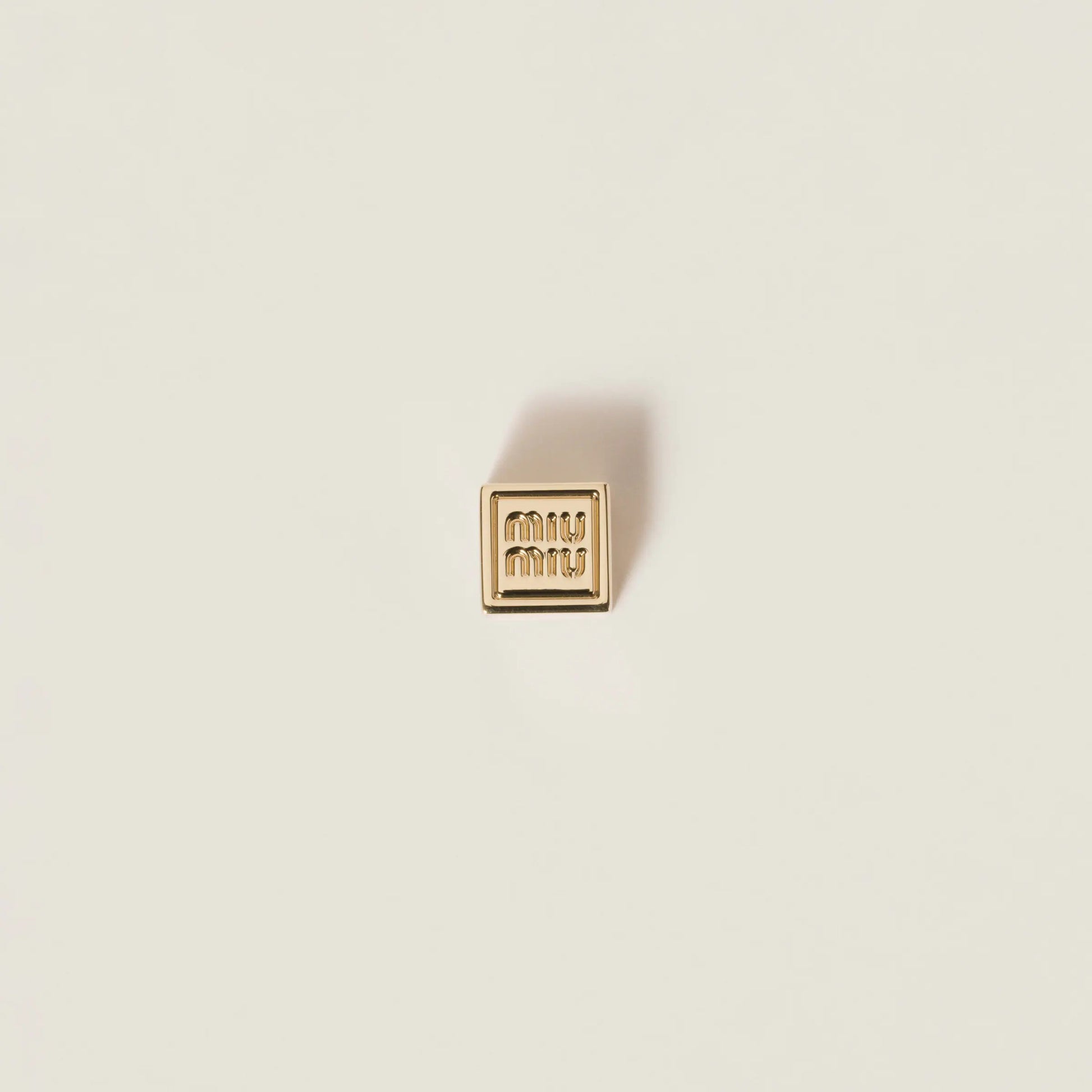Dice charm with logo