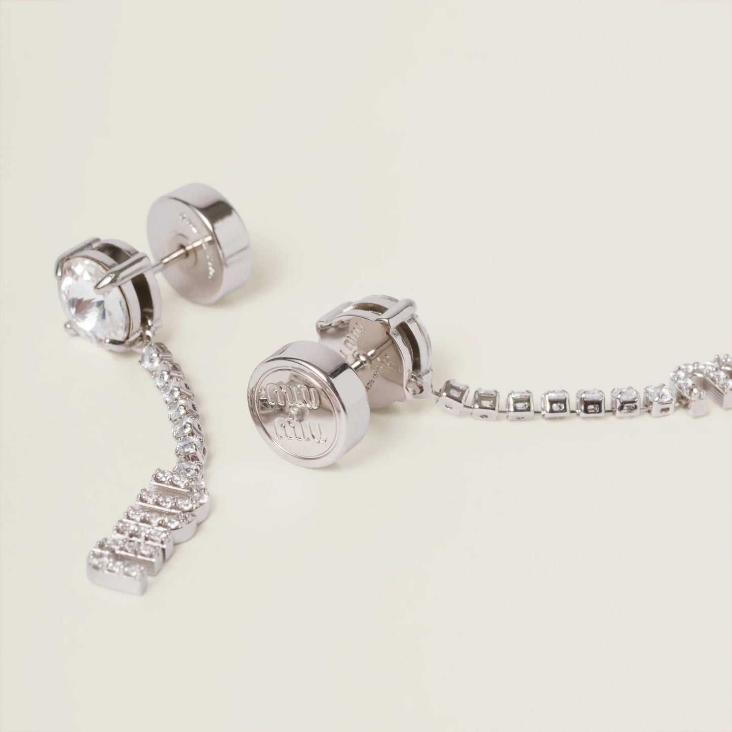 Metal earrings with crystals