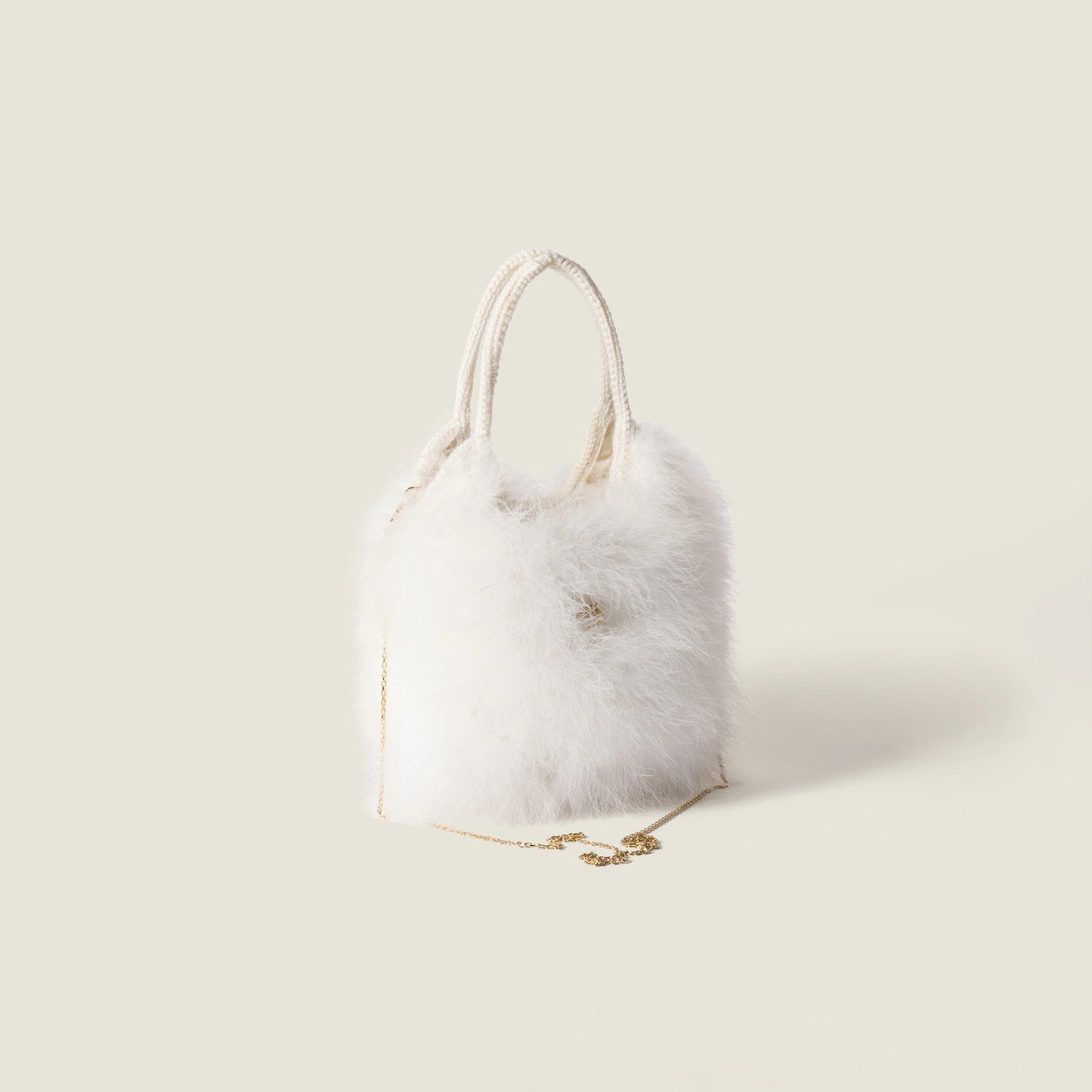 Ivy crochet handbag with feathers