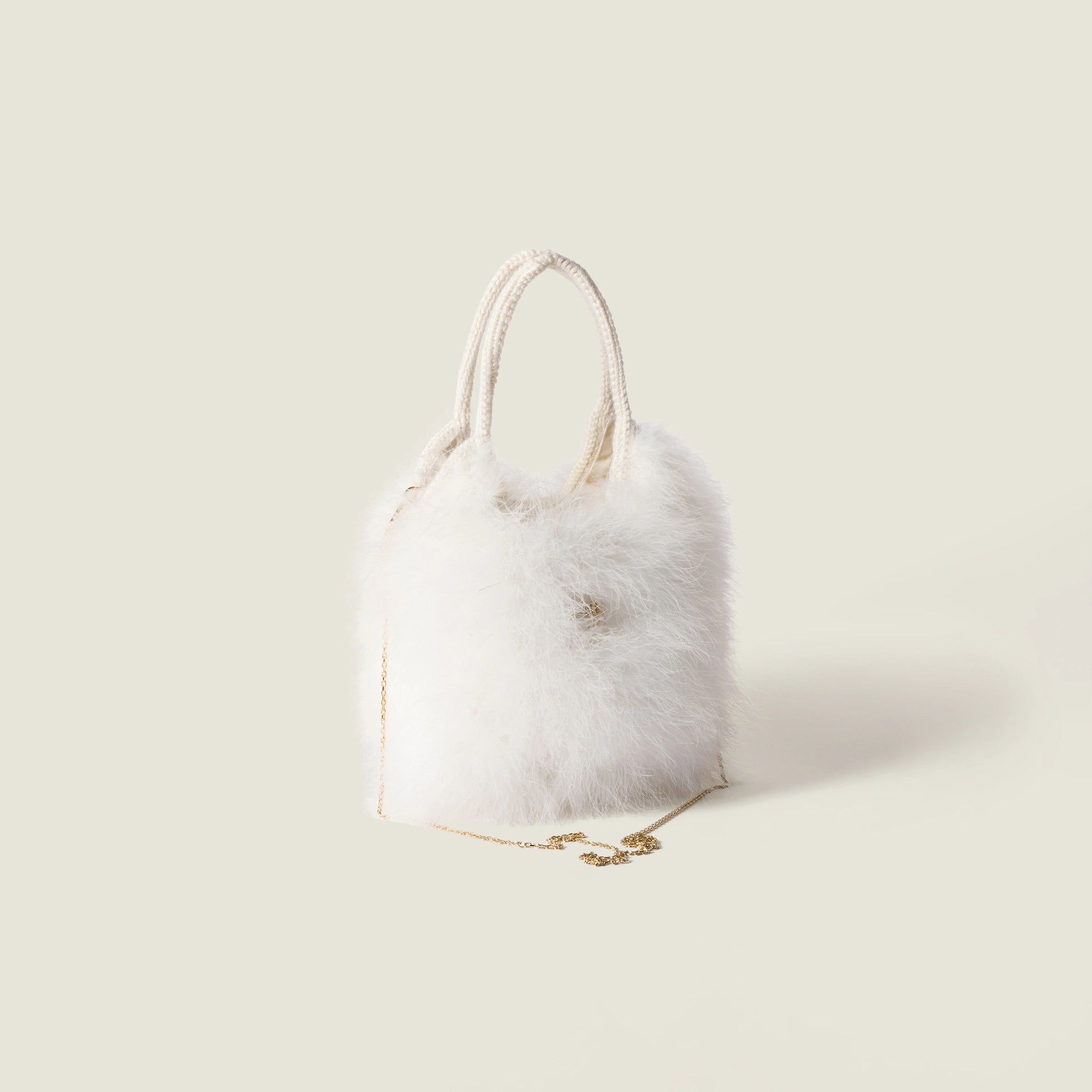 Ivy crochet handbag with feathers