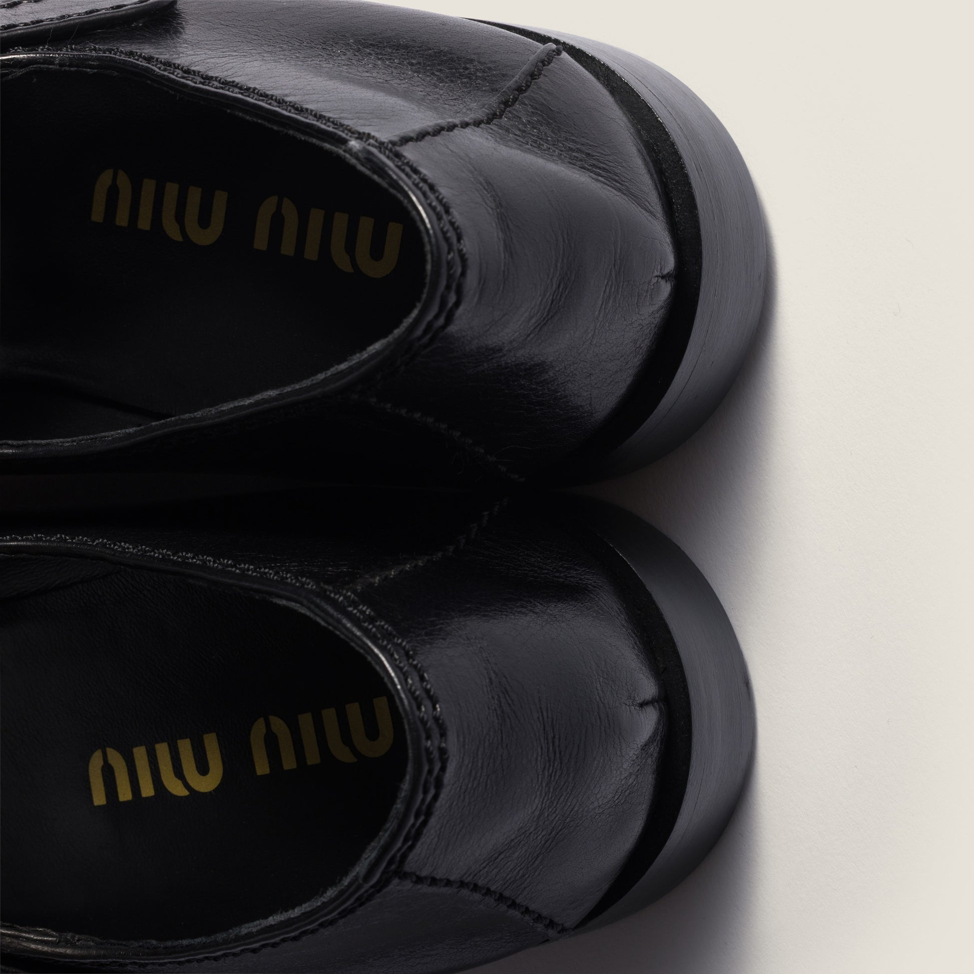 Leather loafers with strap