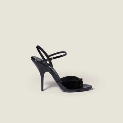 Patent leather sandals with buckles