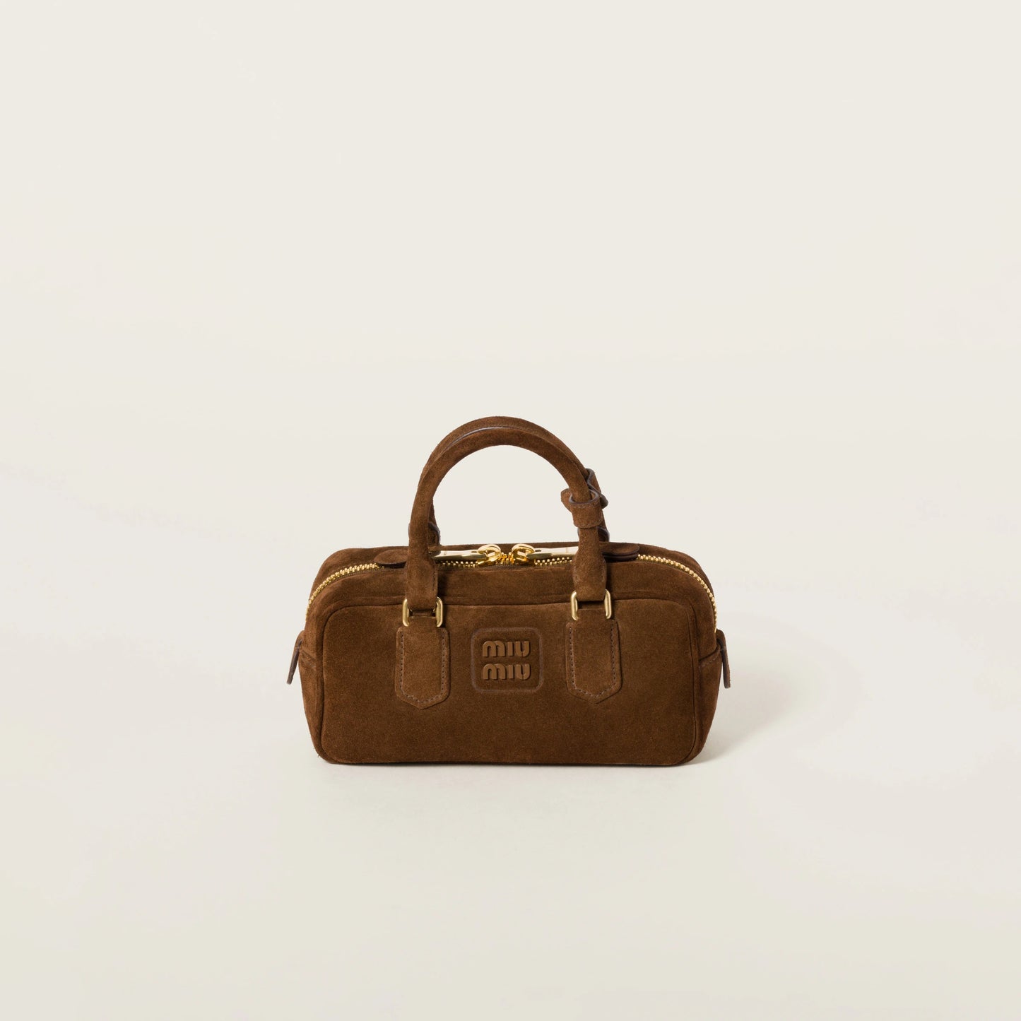 Arcadie padded suede top-handle bag