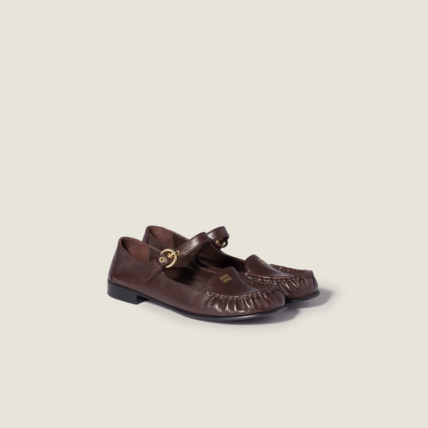 Leather loafers with strap