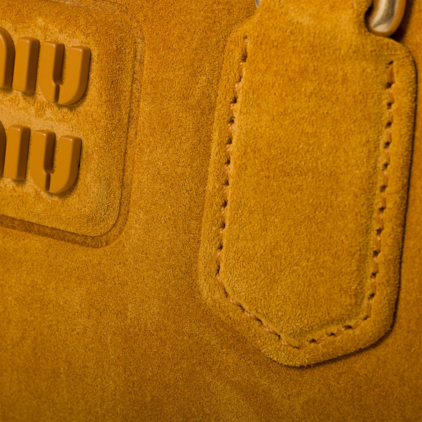 Arcadie padded suede top-handle bag