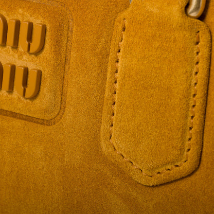 Arcadie padded suede top-handle bag