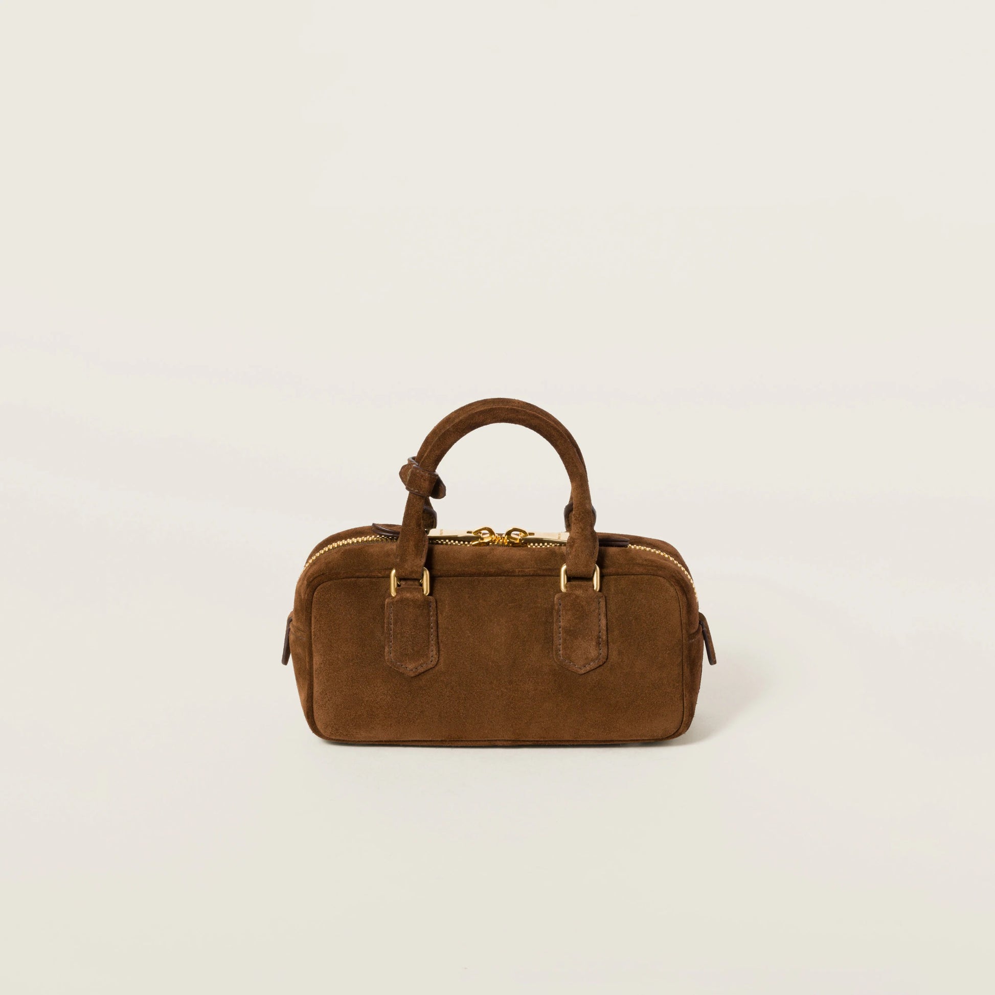 Arcadie padded suede top-handle bag