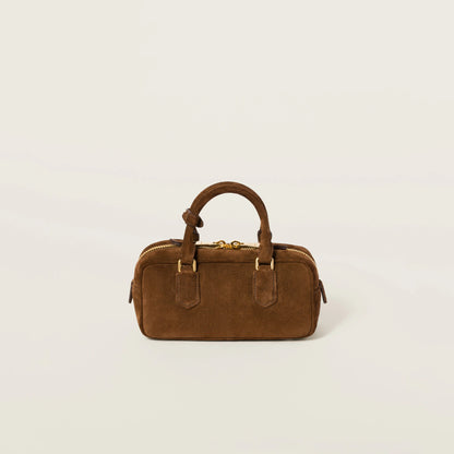 Arcadie padded suede top-handle bag