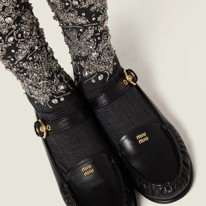 Leather loafers with strap