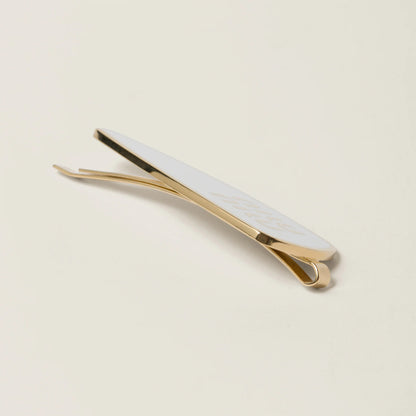 Enameled metal hair clip