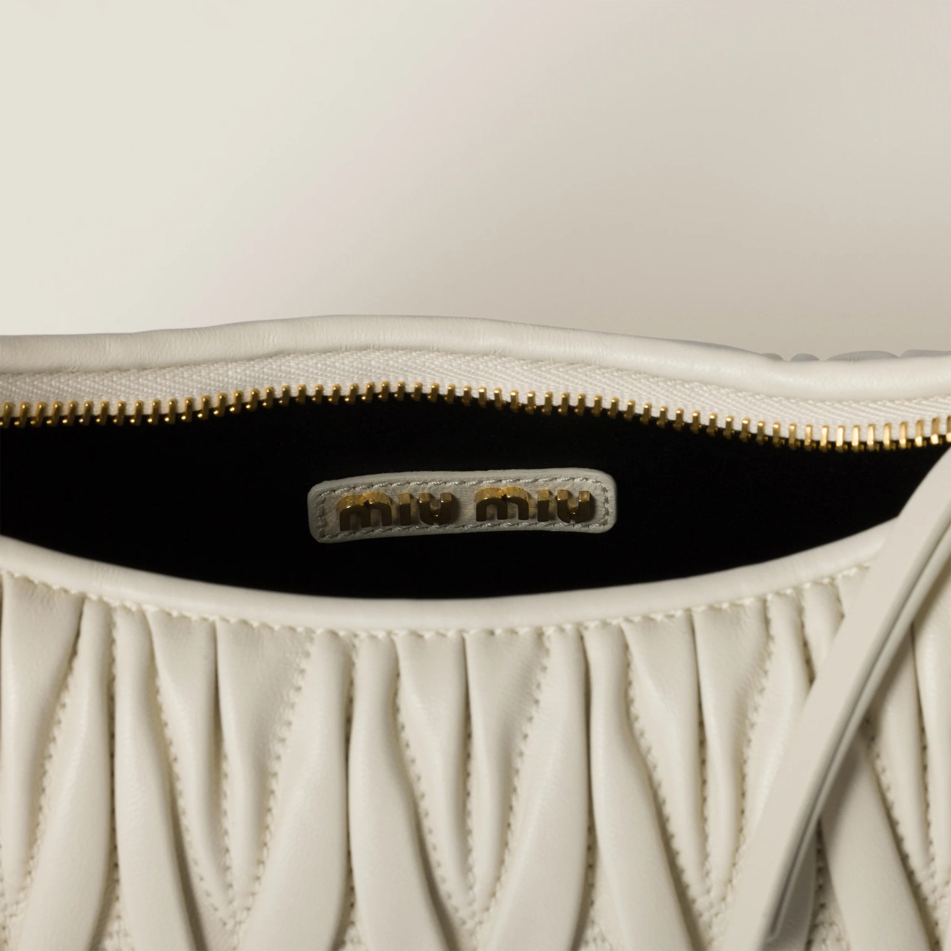 Wander matelassé nappa leather hobo bag