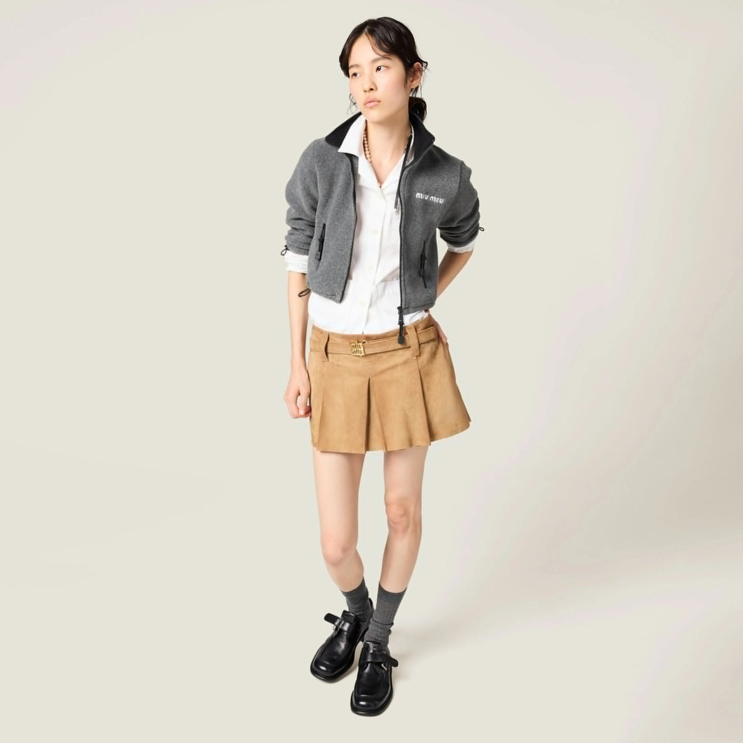 Pleated suede skirt