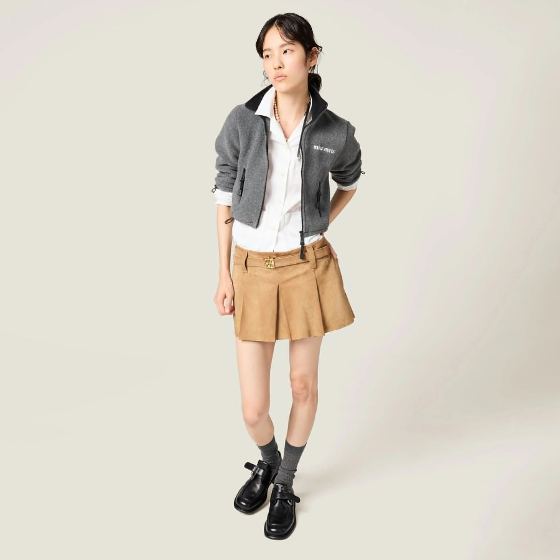Pleated suede skirt