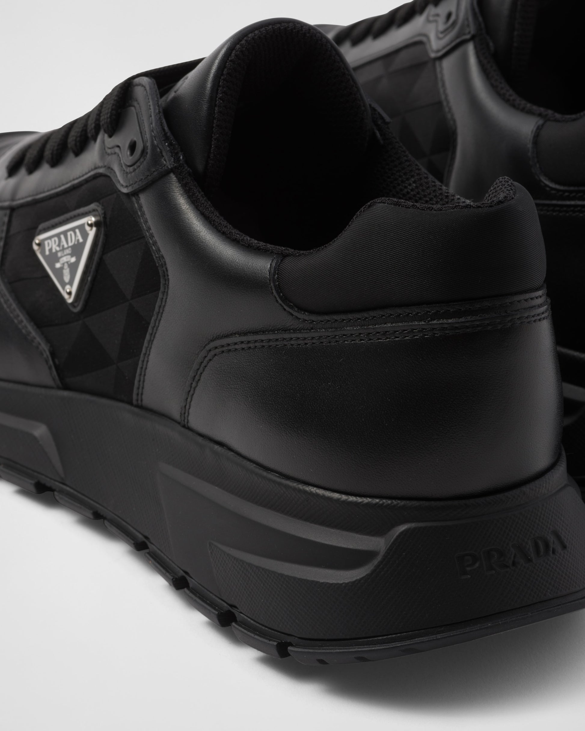Leather and Re-Nylon high-top sneakers
