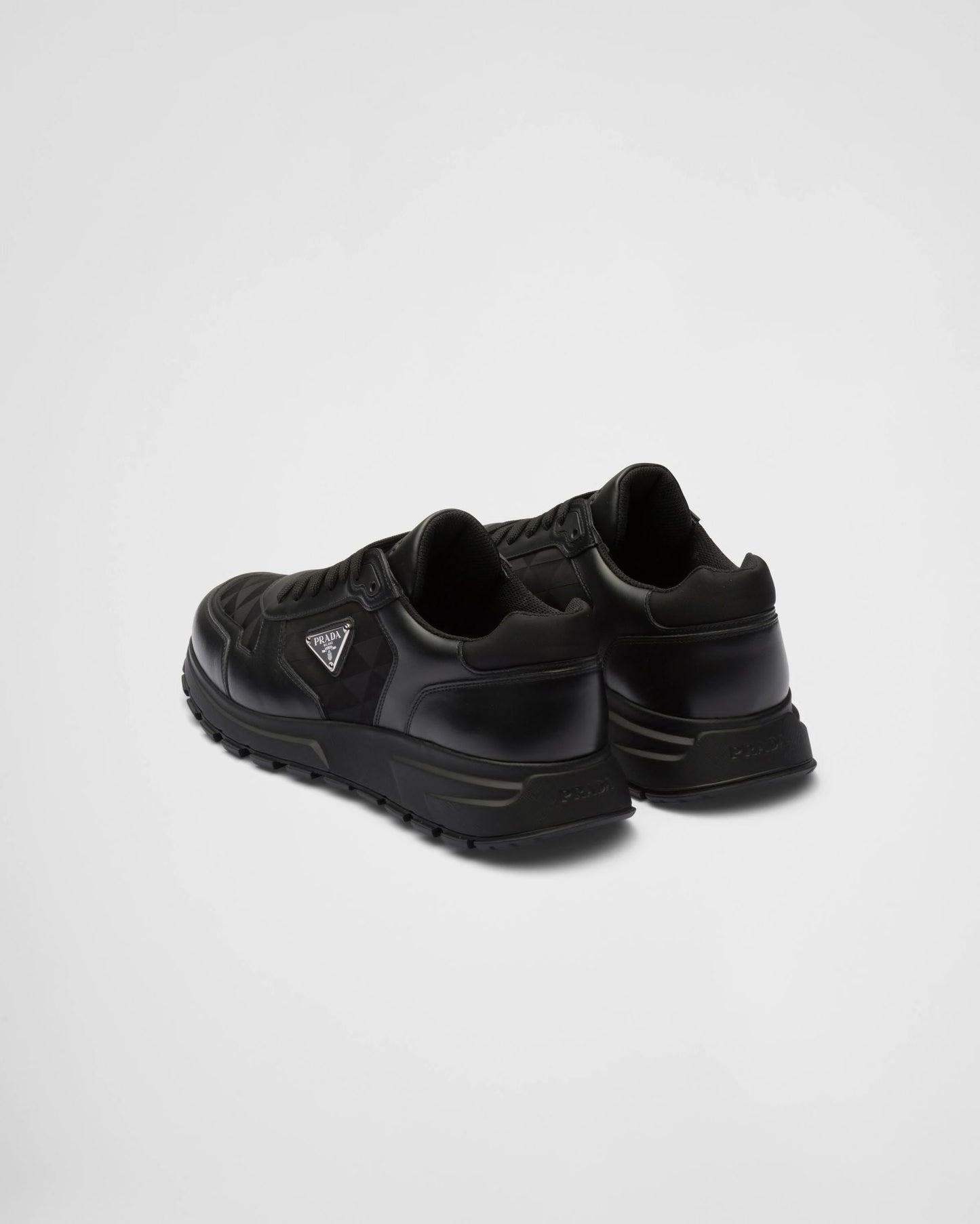 Leather and Re-Nylon high-top sneakers